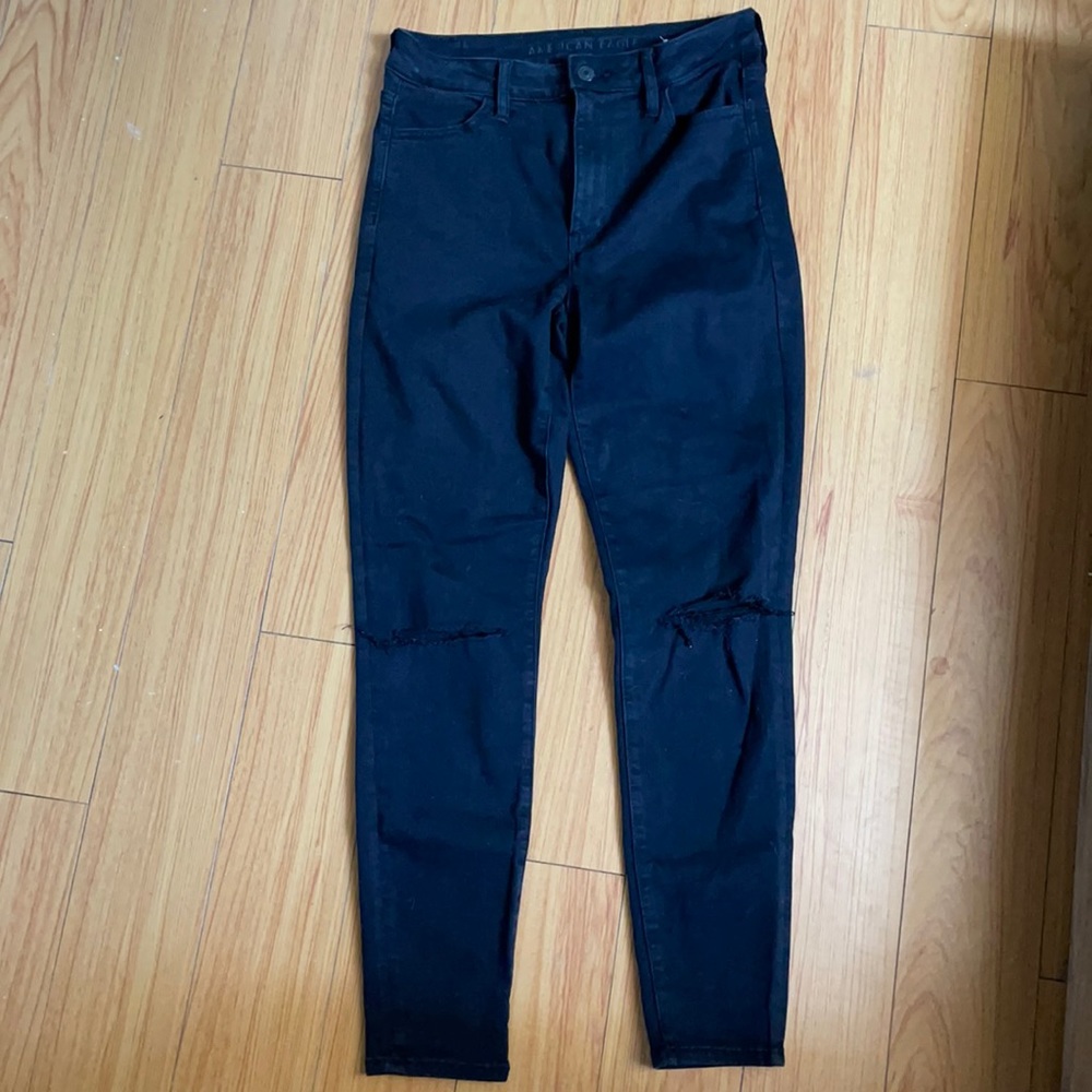American Eagle black jegging ripped knees